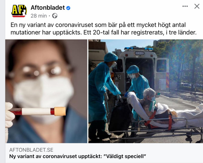 Sjukvårdspersonal i skyddsutrustning vid ambulans med patient på bår.