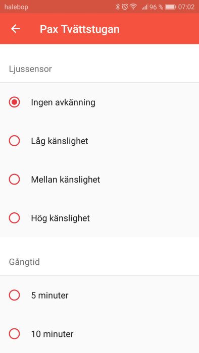 Skärmdump av app för tvättstuga visar ljussensor inställningar och val av gångtid.