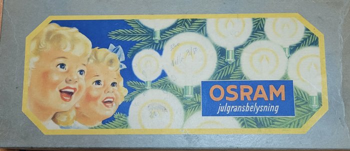 Vintage OSRAM julgransbelysningsförpackning med illustration av ljus och leende barn.