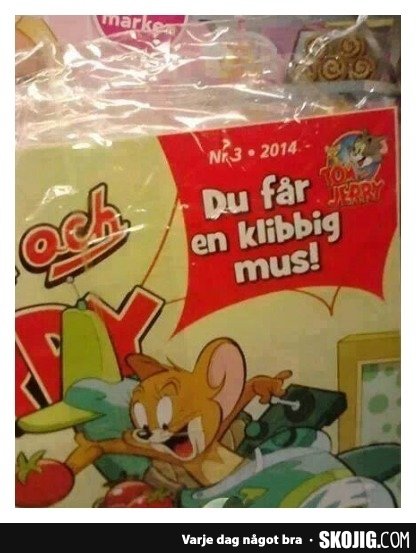 Omslag på serietidning "Tom och Jerry" från 2014 med texten "Du får en klämmig mus!" och komiska figurer.