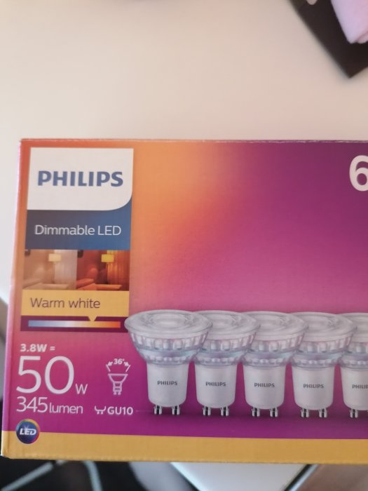 Förpackning med 6 Philips dimbara LED-lampor, 3.8W motsvarande 50W, GU10-sockel.