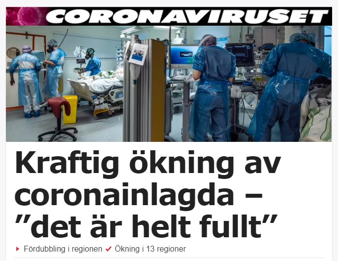 Sjukhuspersonal i skyddsutrustning arbetar med patienter på en intensivvårdsavdelning.
