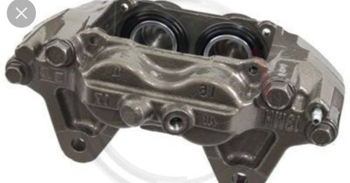 Bromsok för fordon i metall med synliga kolvar och fästpunkter.