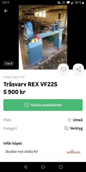 En blå träsvetsmaskin, REX VF225, i ett rörigt garage med cyklar i bakgrunden.