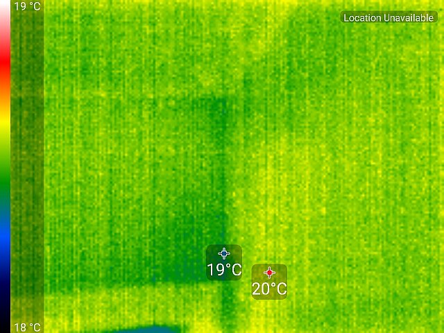 Värmebild som visar temperaturskillnader i ett rum med 19°C och 20°C uppmärkta punkter.