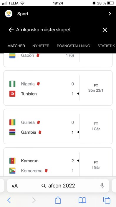 Resultattabell från Afcon 2022 med röda kort ikoner vid fotbollsmatcher mellan Gabon och Tunisien, Nigeria och Gambia, samt Kamerun och Komorerna.