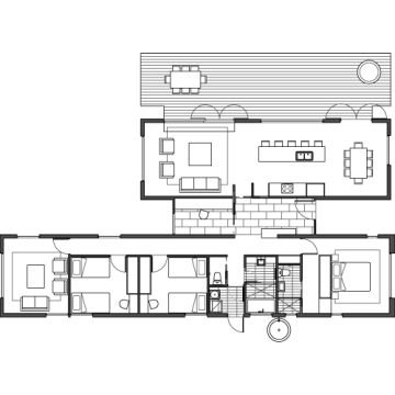 Arkitektritning av en planlösning för ett hus med möblering.