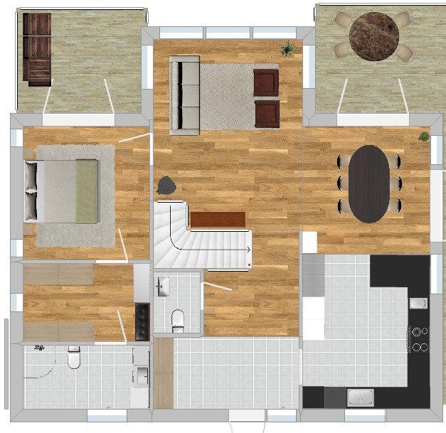 Översiktsbild av en husplan visar en layout med vardagsrum, kök, sovrum och badrum i en föreslagen design från en arkitekt.