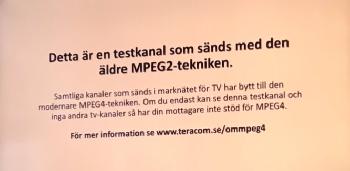 Informationsmeddelande på TV-skärm om MPEG2-testkanal och övergång till MPEG4-teknik.