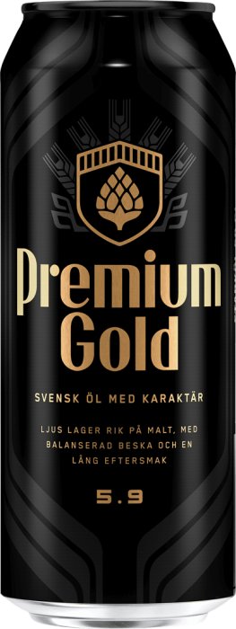 Burk av Spendrups Premium Gold öl, svart med gyllene text, beskrivning av lager och alkoholhalt.