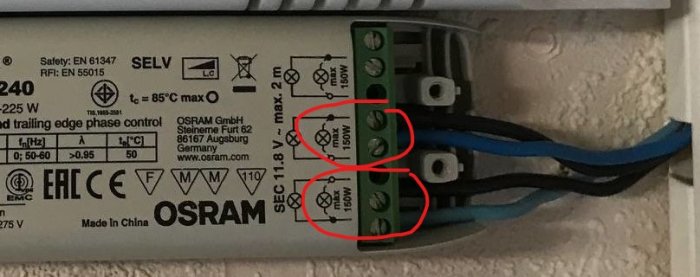 Närbild av en Osram-drivdonsanslutning med två par utgående kablar, ena paret utmarkerat för test.