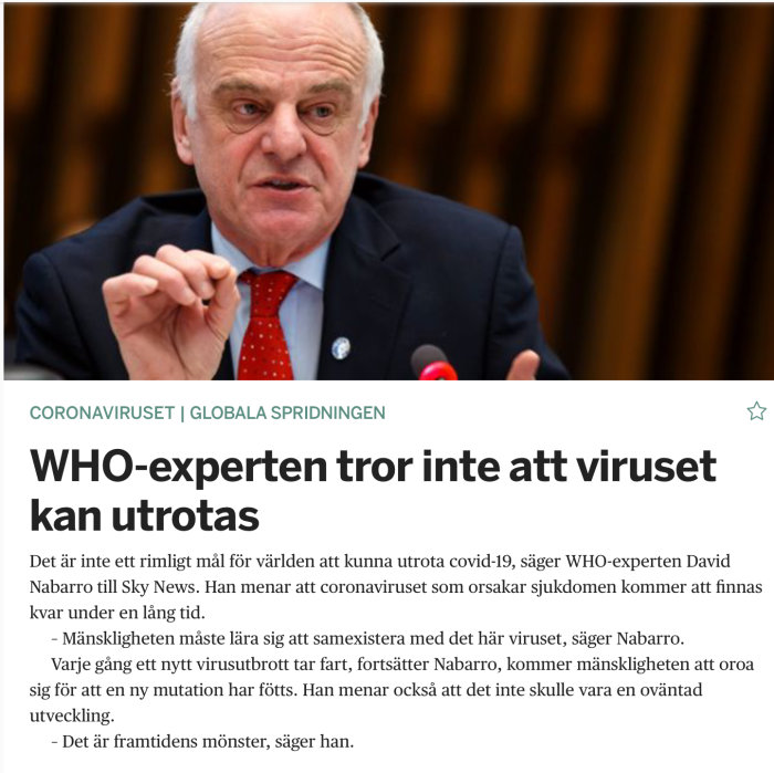 WHO-expert pekar och talar under en presskonferens om coronaviruset.