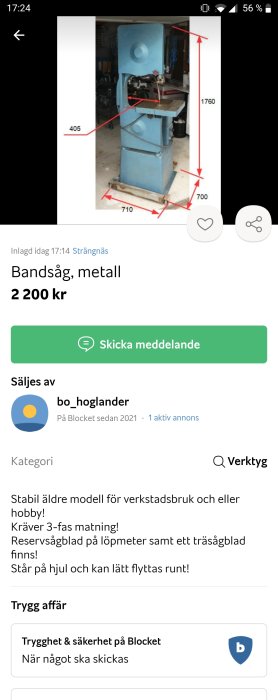 Blå bandsåg för metall med måttangivelser, till salu på annonssida, mot garagebakgrund.