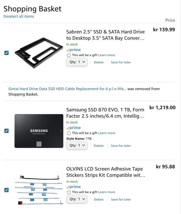 Skärmdump av webbutikskorg med SSD, SATA-bay converter och LCD-skärmtejp för datorreparation.