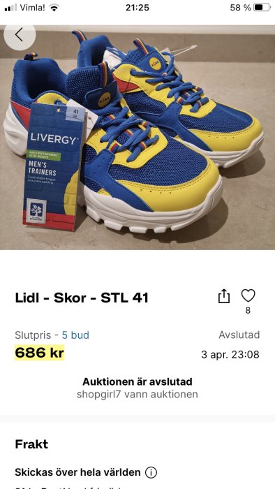 Nyproducerade blå och gula herrträningsskor från Lidl, storlek 41, visade på auktionssida.