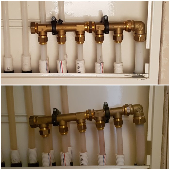 Installation av mässingsfördelare med flera kopplade isolerade rör i en väggmonterad enhet.