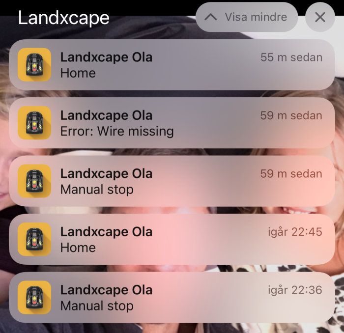 Smartphoneskärm som visar notiser från ''Landxcape Ola'' om felmeddelanden och manuell stopp.