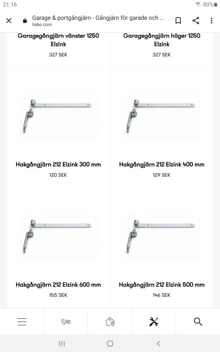 Fyra olika storlekar av portgångjärn i Elzink för garage, från vänster 300 mm till höger 600 mm.