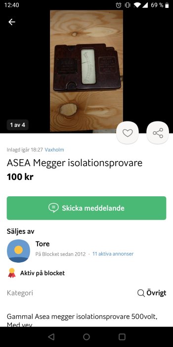 Gammal ASEA Megger isolationsprovare på ett träunderlag.