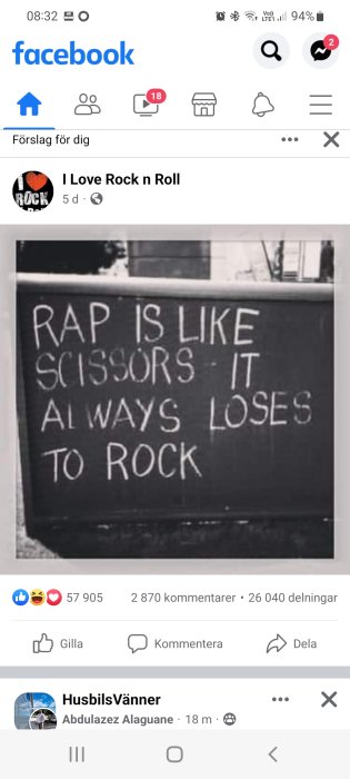 Skärmdump från Facebook som visar ett inlägg med en tavla där det står "RAP IS LIKE SCISSORS - IT ALWAYS LOSES TO ROCK".