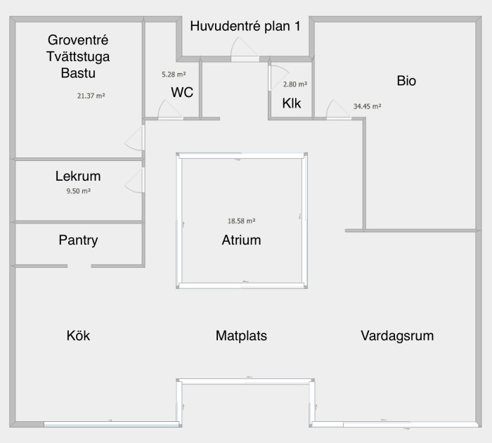 Planritning av 1,5 plans hus med etiketterade rum som atrium, bio, lekrum och bastu.