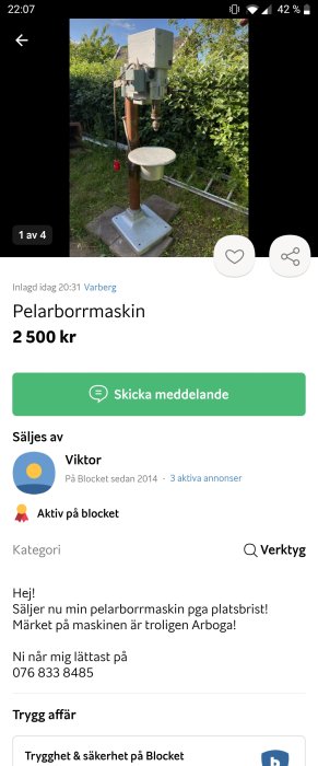 Begagnad pelarborrmaskin till salu, placerad utomhus med omgivande grönska, priset 2500 kr.