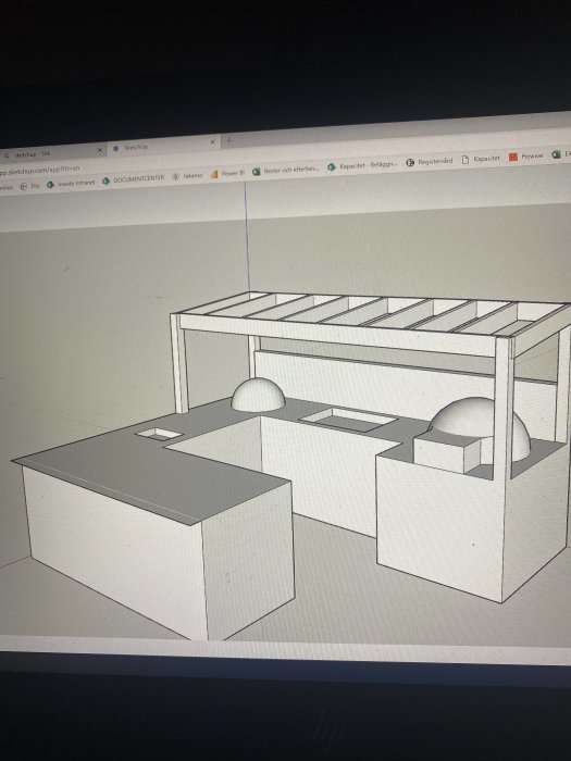 3D-modell av ett planerat utekök med arbetsbänkar och inbyggda enheter.