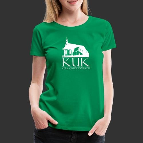 Person som bär en grön t-shirt med logotypen och texten "KUK KYRKANS UNDGOMSKÖR".