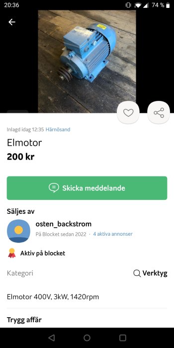 Blå industriell elmotor på ett trägolv till salu för 200 kr.