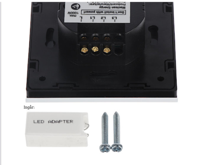 Elektronisk enhet med märkning, LED-adapter och två skruvar, eventuell del av byggprojekt.