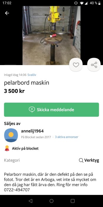 Gul pelarborrmaskin står i ett garage, eventuell defekt, okänd modell.