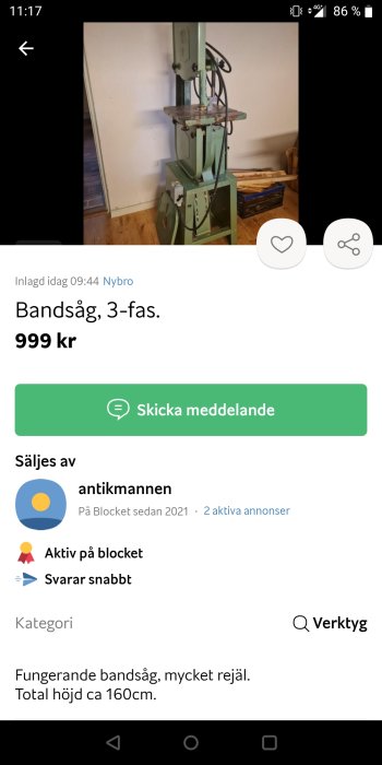 Funktionell bandsåg av grön färg med 3-fas anslutning, märkt till 999 kr. Sågens höjd är ungefär 160 cm.