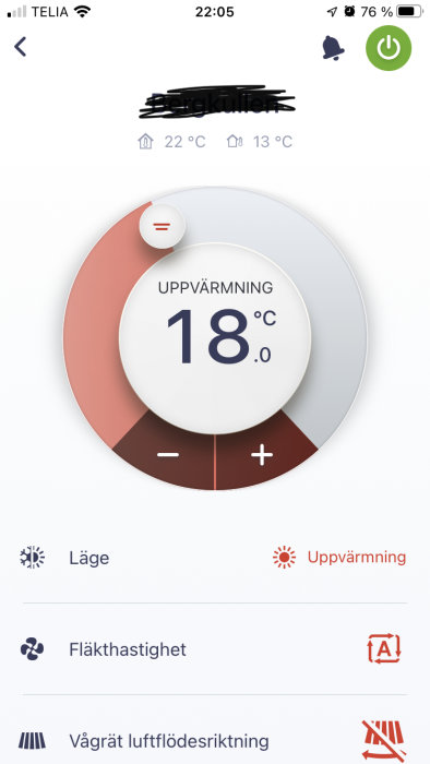 Smart termostatapp visar inomhustemperaturen 18 grader och uppvärmningsläge.