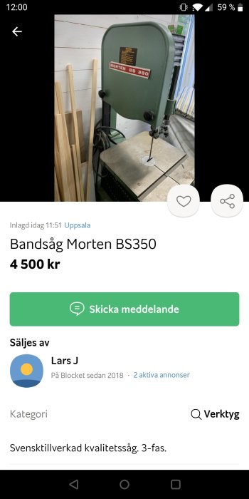 Grön bandsåg Morten BS350 i en verkstadsmiljö med träplankor i bakgrunden.