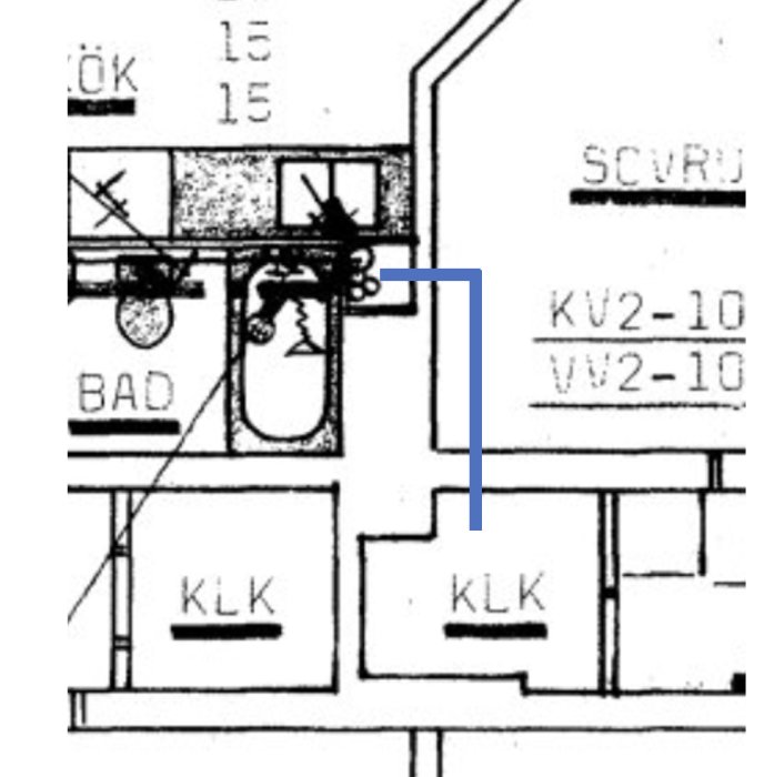 Ritning med markering för avlopp och tappvattenledningar i ett planerat badrum, nära en murstock.