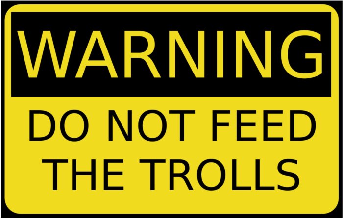 Gul skylt med svart text "WARNING DO NOT FEED THE TROLLS" som symbol för diskussion om klagomål och tvister.