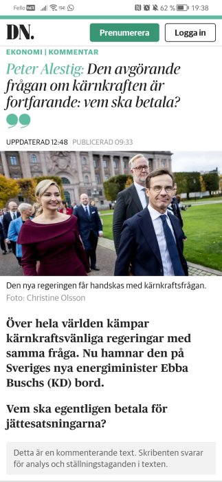 Skärmavbild av en mobiltelefon som visar en artikel på DN med rubriken om kärnkraftsfrågan och en bild på politiker.