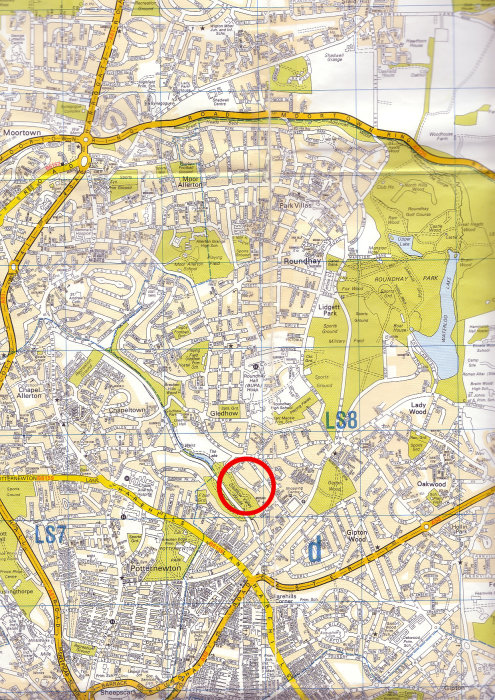 Detaljerad del av karta markerad med röd cirkel för att visa ett specifikt område för byggprojekt.
