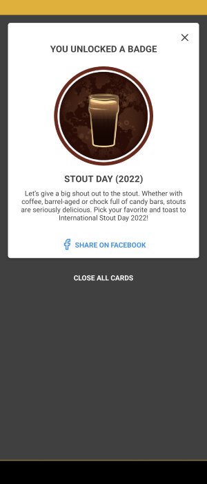 In-app-meddelande firar "Stout Day" med upplåst emblem och delningsalternativ för sociala medier.