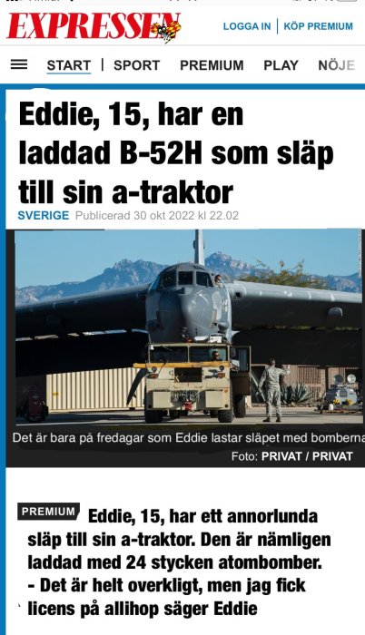 Militärflygplan, förmodligen B-52, lastas, text om pojke och traktor, satirisk artikel, Expressen-logotyp.