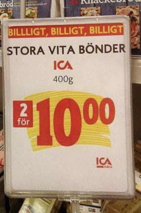 Reklamskylt, erbjudande, "Stora Vita Bönor" från ICA, "2 för 10,00", 400g viktangivelse, "BILLIGT" ovanför.