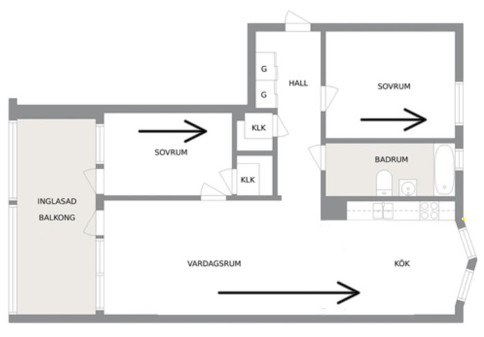 Planritning av en lägenhet med vardagsrum, kök, sovrum, badrum, balkong, hall och klädkammare.