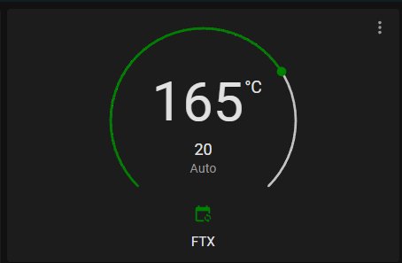 Digital display visar 165 grader Celsius, grön progressindikator, auto-läge aktivt, batterisymbol, text "FTX".