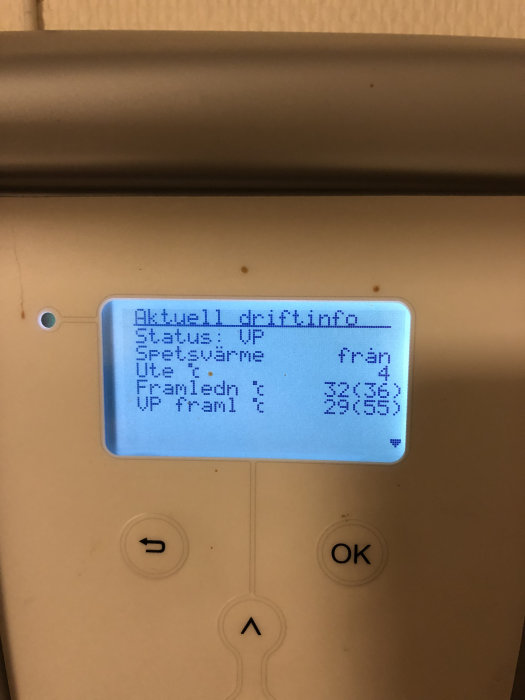 LCD-display visar text "Aktuell driftinfo", med knappar för navigering nedanför.