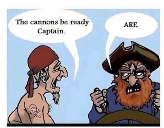 Två tecknade pirater pratar, kaptenen rättar grammatik, humoristisk bild.