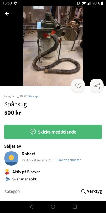 En spånsugsmaskin i ett verkstadsutrymme annonseras för försäljning på en köp-och-sälj plattform.