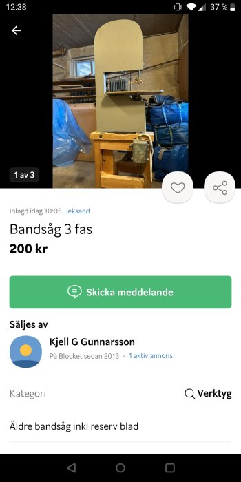 Bandsåg till salu på Blocket, beige, i garage, för 200 kronor.