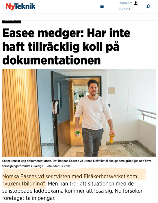 Man i korridor med dryckesburkar, företag nämnt, dokumentationsproblem diskuteras, tidningsartikelbild.