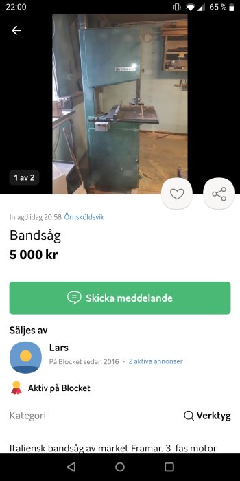 Grön bandsåg till salu på Blocket, i en verkstad, kostar 5000 kr.