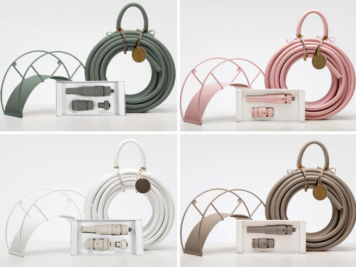 Fyra sladdväskor i olika färger med matchande kablage och broar som visningsställ. Elegant, minimalistisk design.